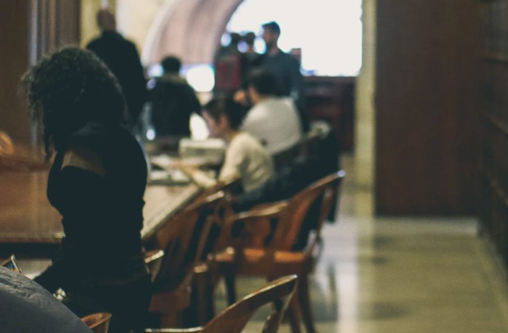 library corridor with students studying